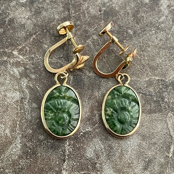 Vintage 14k carved jade twist on earrings.